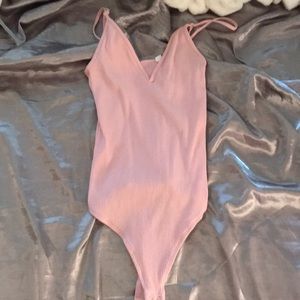 Pink body suit